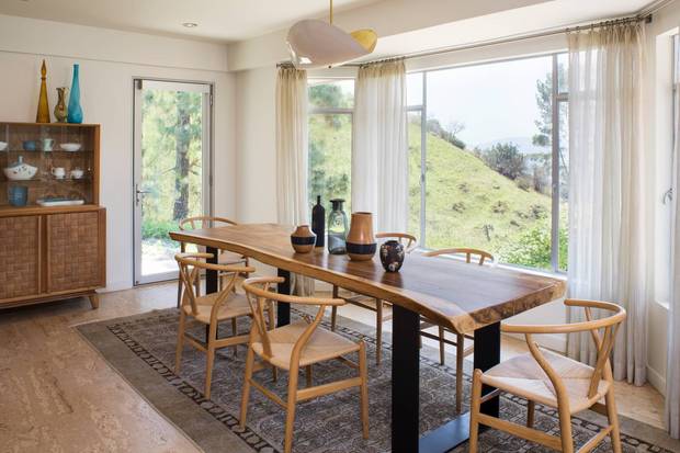 exclusive-home-tour-mid-century-goals-mid-century-modern-design-dining-room-with-wood-chairs-582cb0c5eeb90a08340c6302-w620_h800